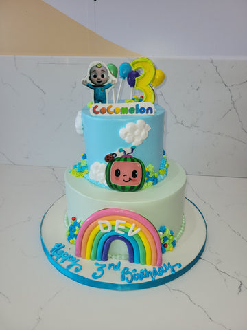 COCOMELON TIERED CREAM CAKE