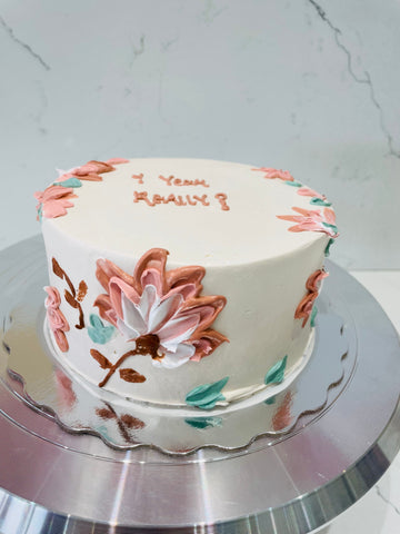 IVORY FLORAL CREAM CAKE