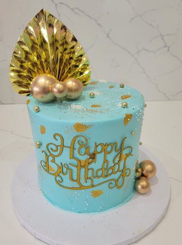 TEAL & GOLD CREAM CAKE