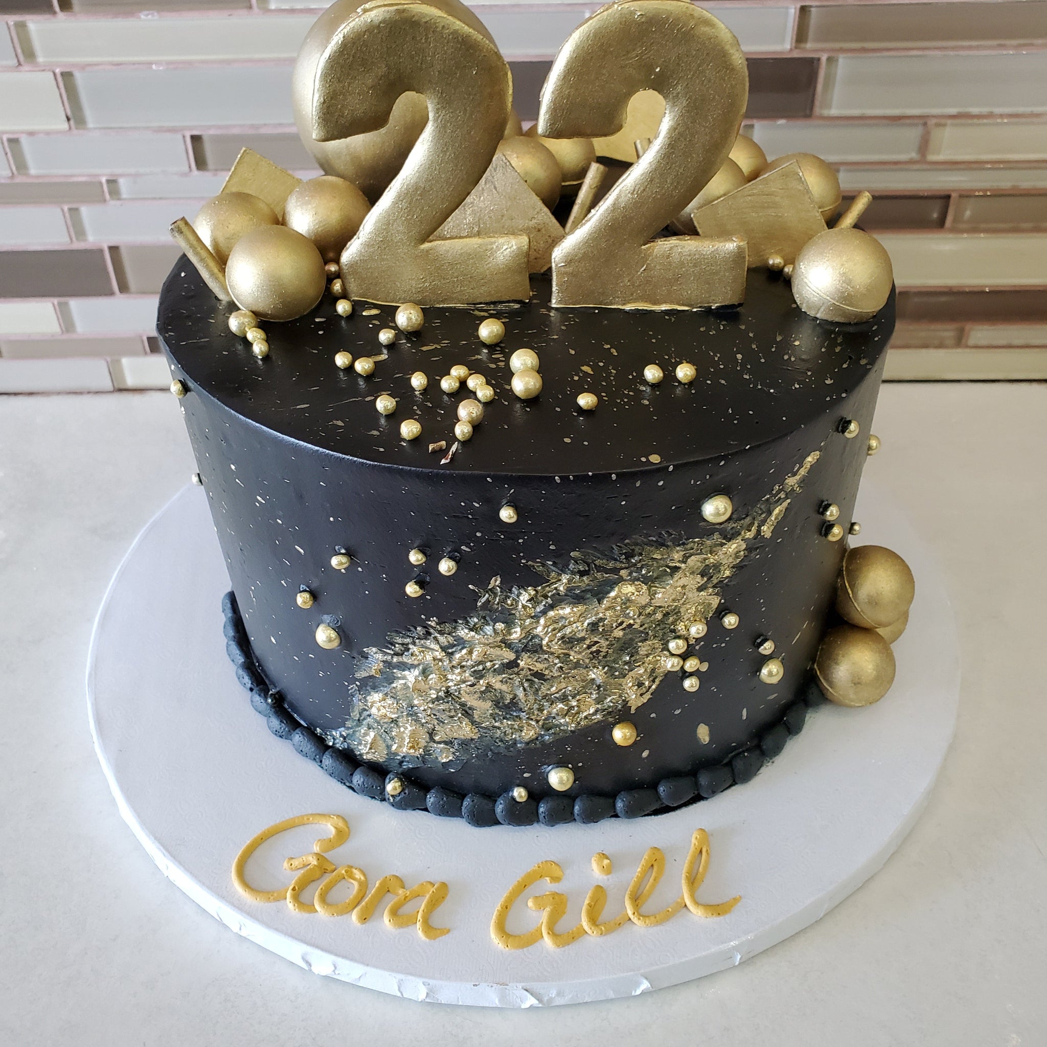 BLACK AND GOLD BIRTHDAY CAKE