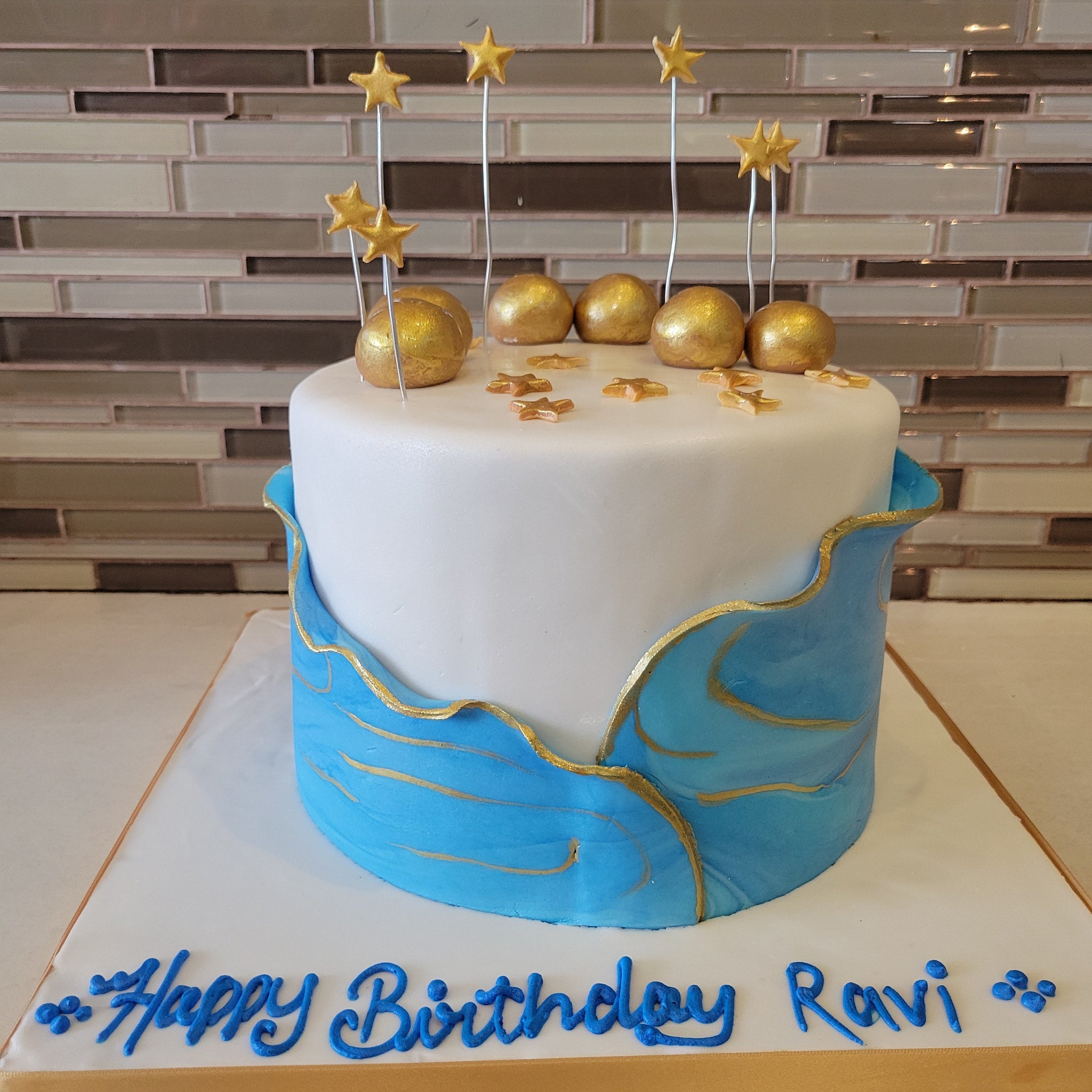 BLUE GOLD RUFFLE CAKE