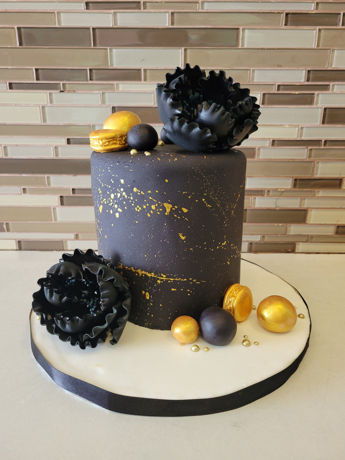 BLACK AND GOLD FONDANT CAKE