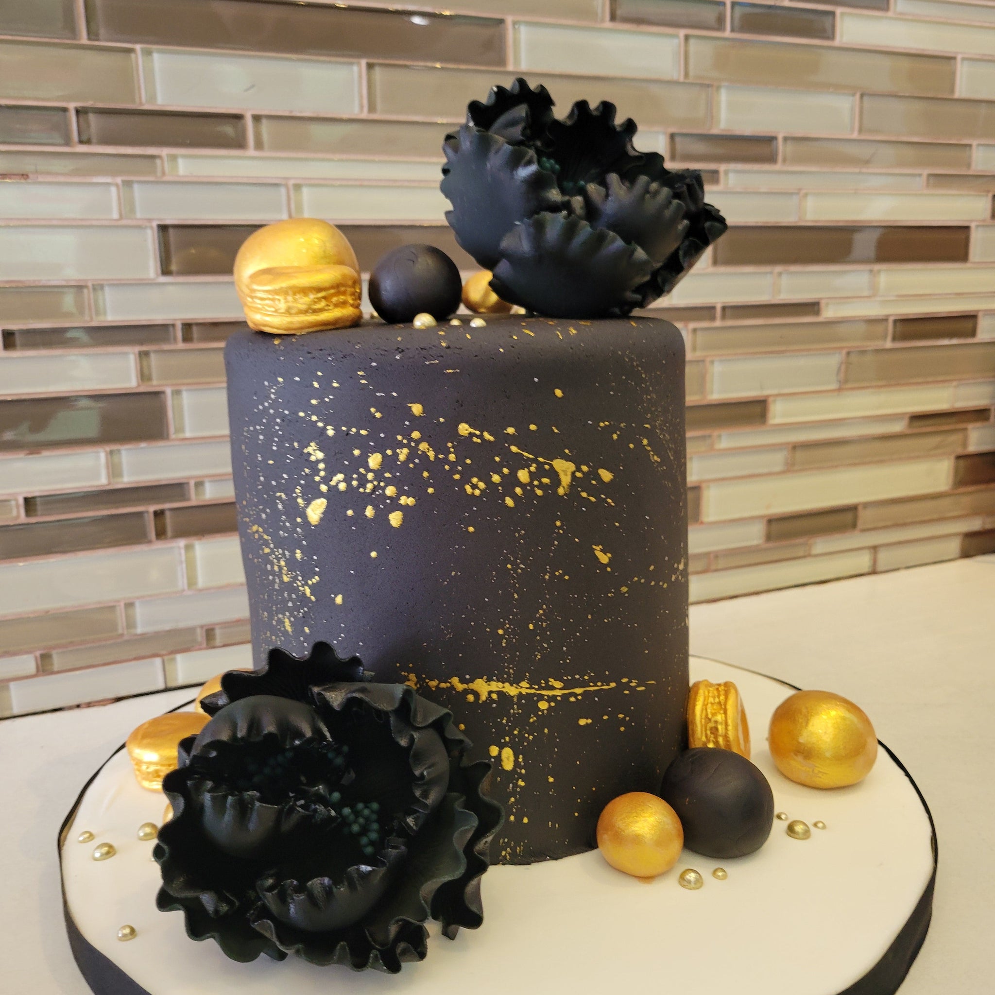 BLACK AND GOLD FONDANT CAKE