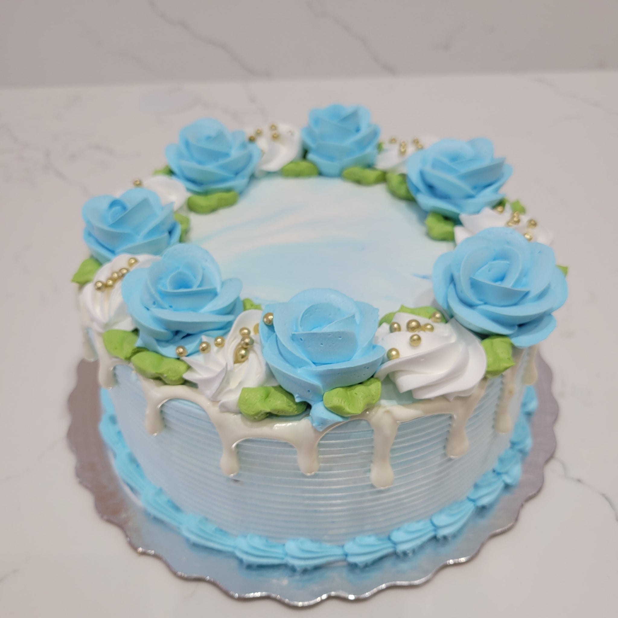 BLUE AND WHITE DRIP CREAM CAKE