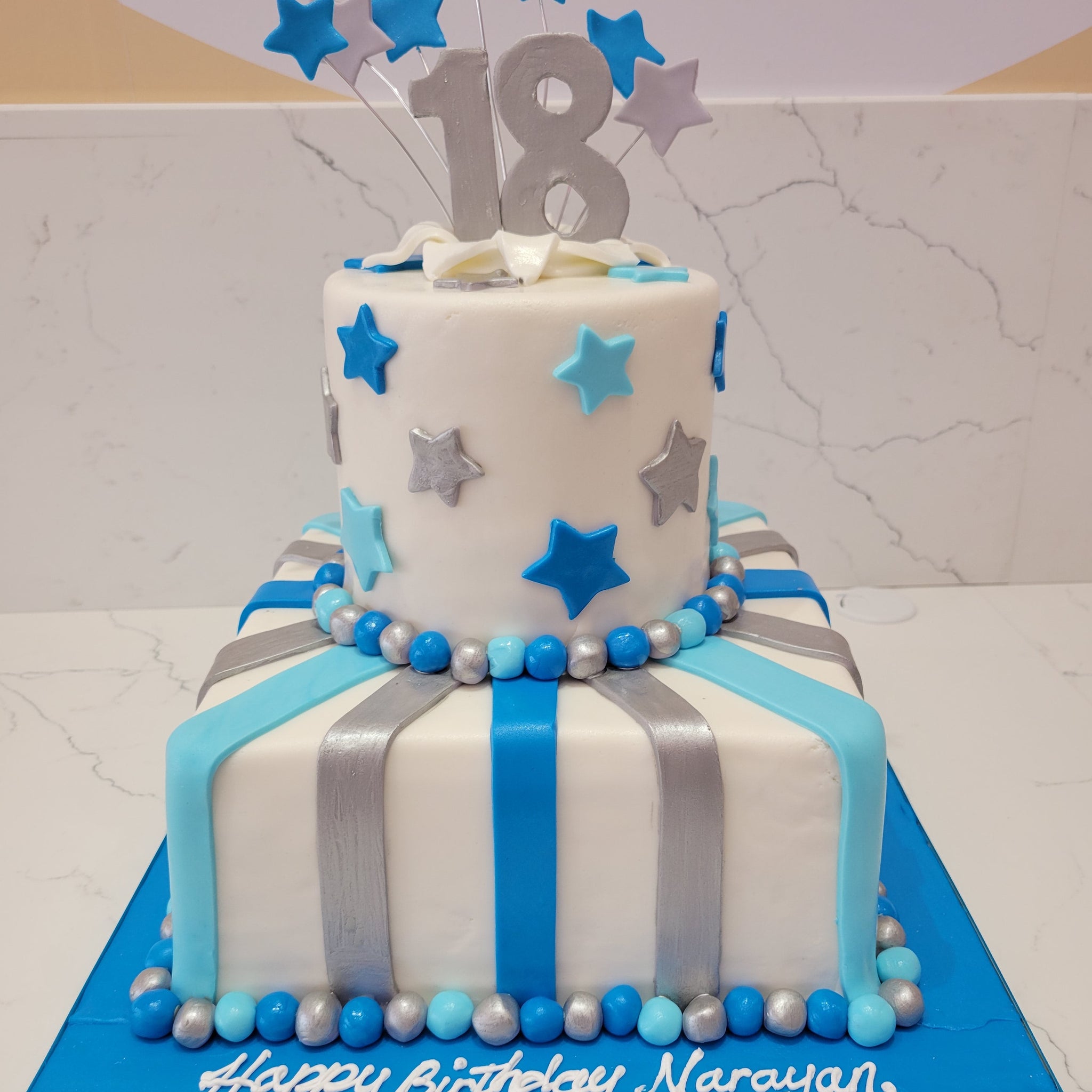 BLUE & SILVER FONDANT TIERED CAKE