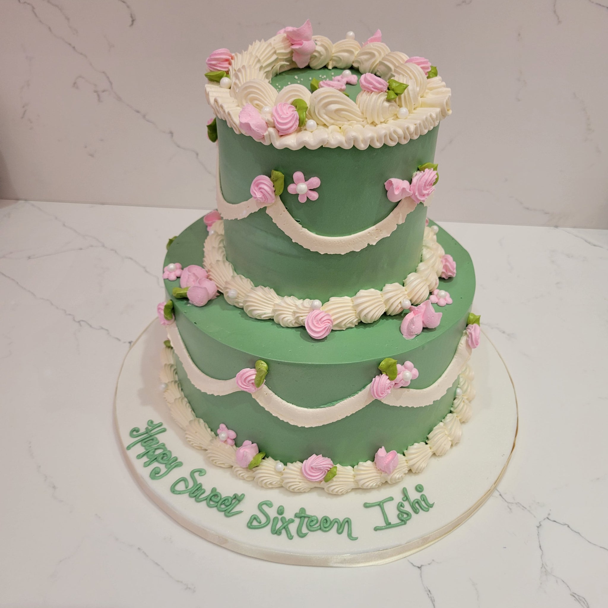 ISHI'S SWEET SIXTEEN CREAM TIERED CAKE