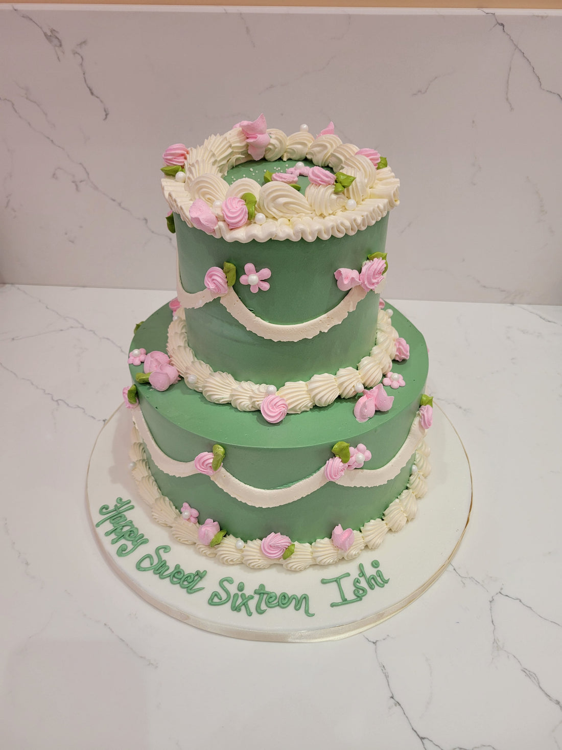 ISHI'S SWEET SIXTEEN CREAM TIERED CAKE