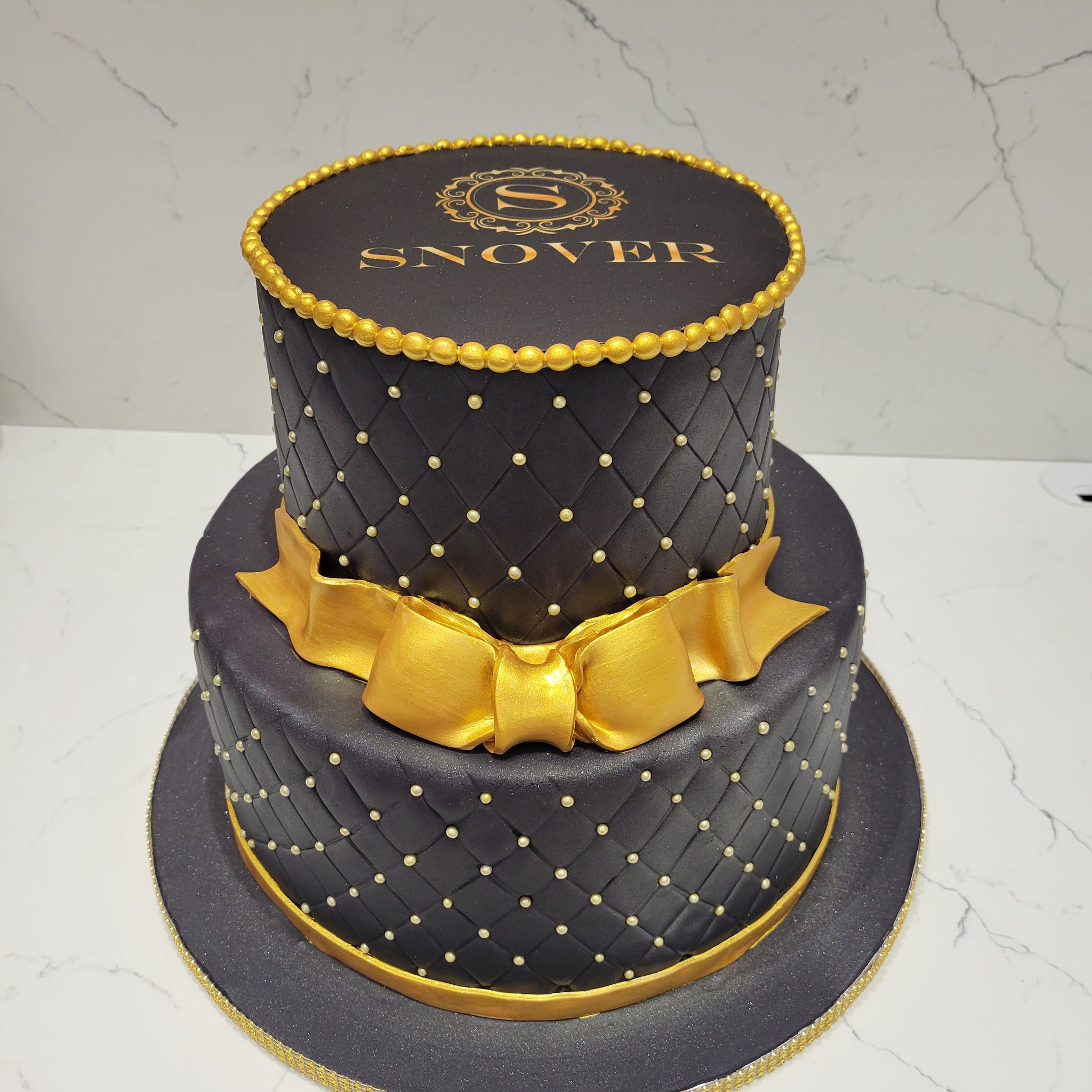 SNOVER BLACK & GOLD FONDANT TIERED CAKE