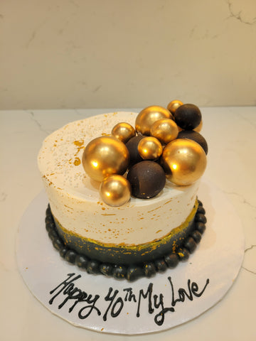 STACEY BLACK AND GOLD CAKE
