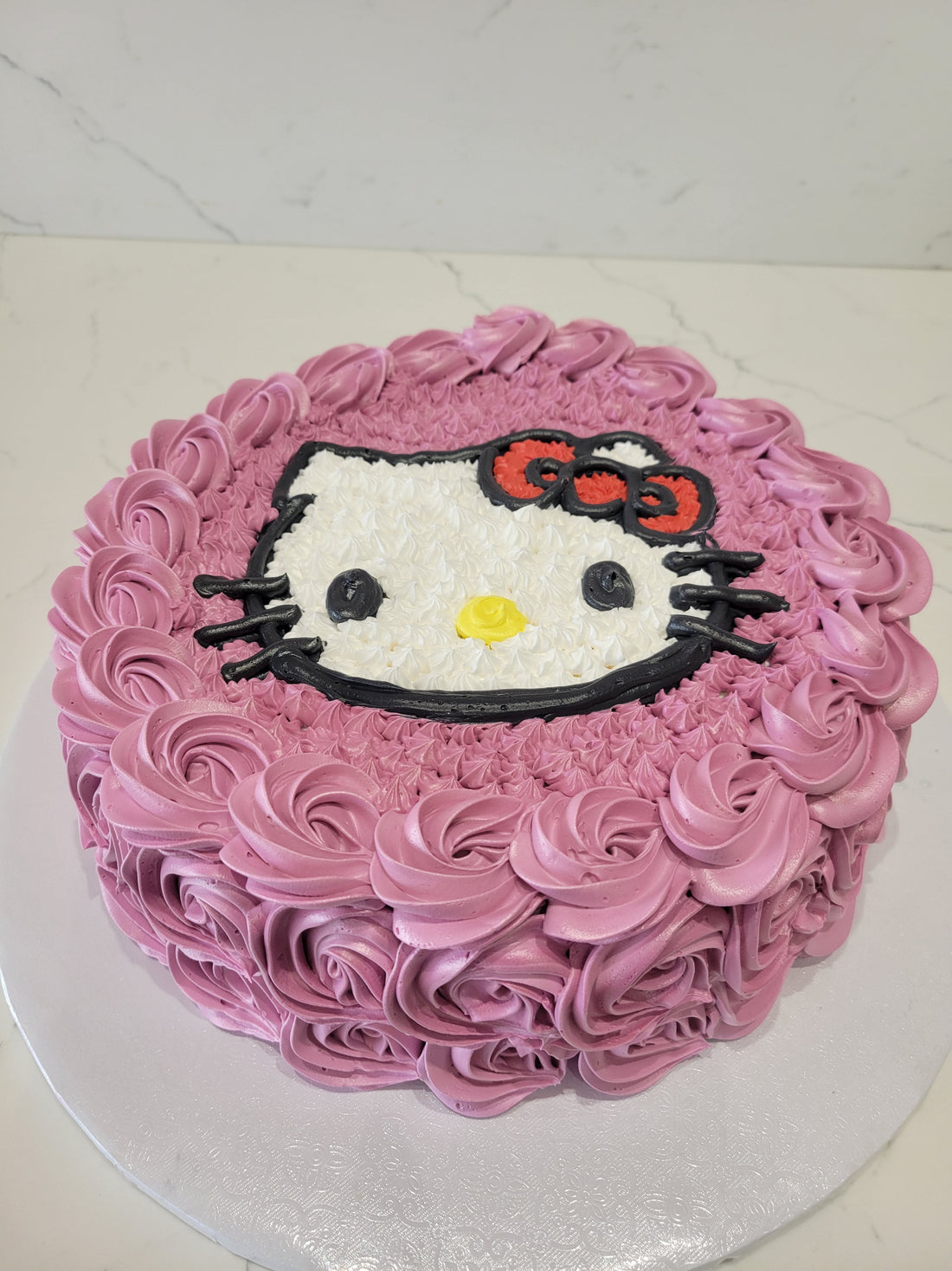 HELLO KITTY ROSETTE CAKE