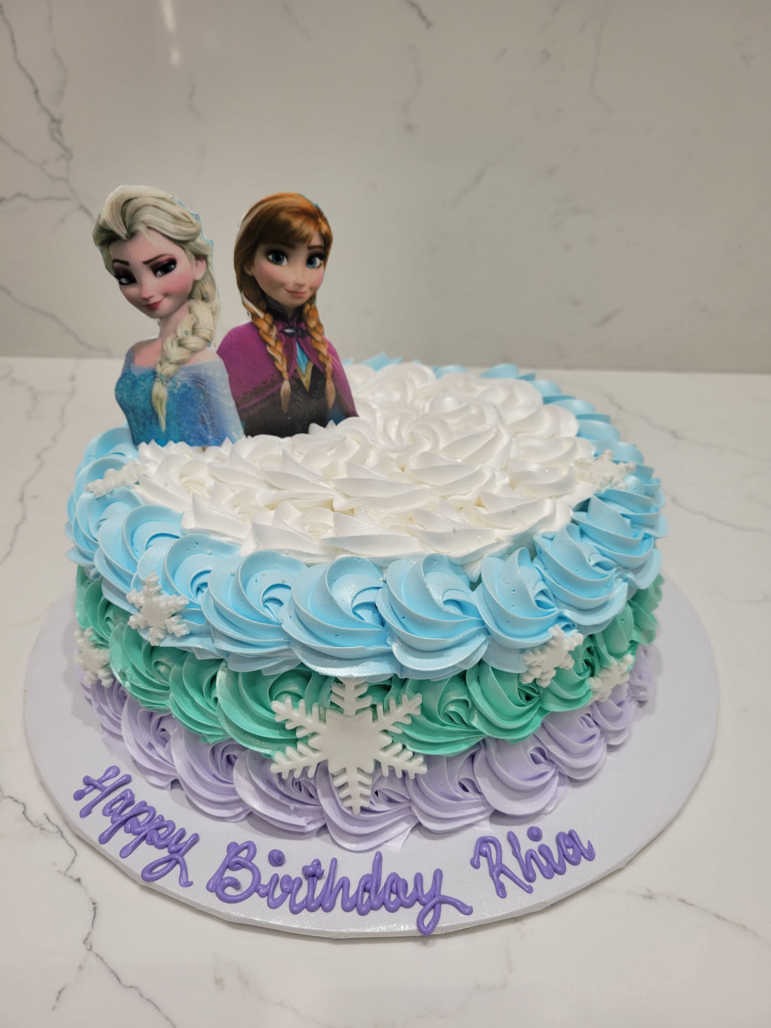 RHIA FROZEN ROSETTE CREAM CAKE