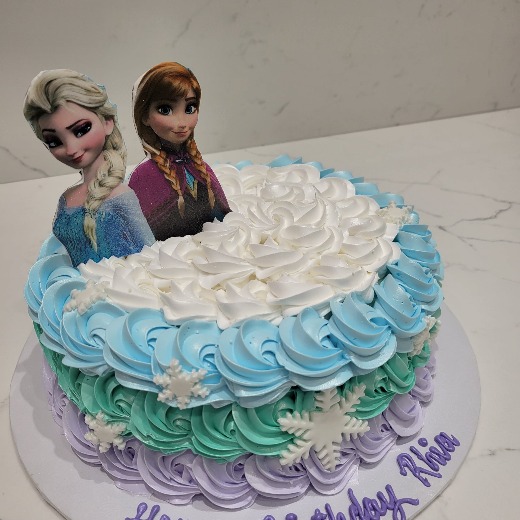 RHIA FROZEN ROSETTE CREAM CAKE