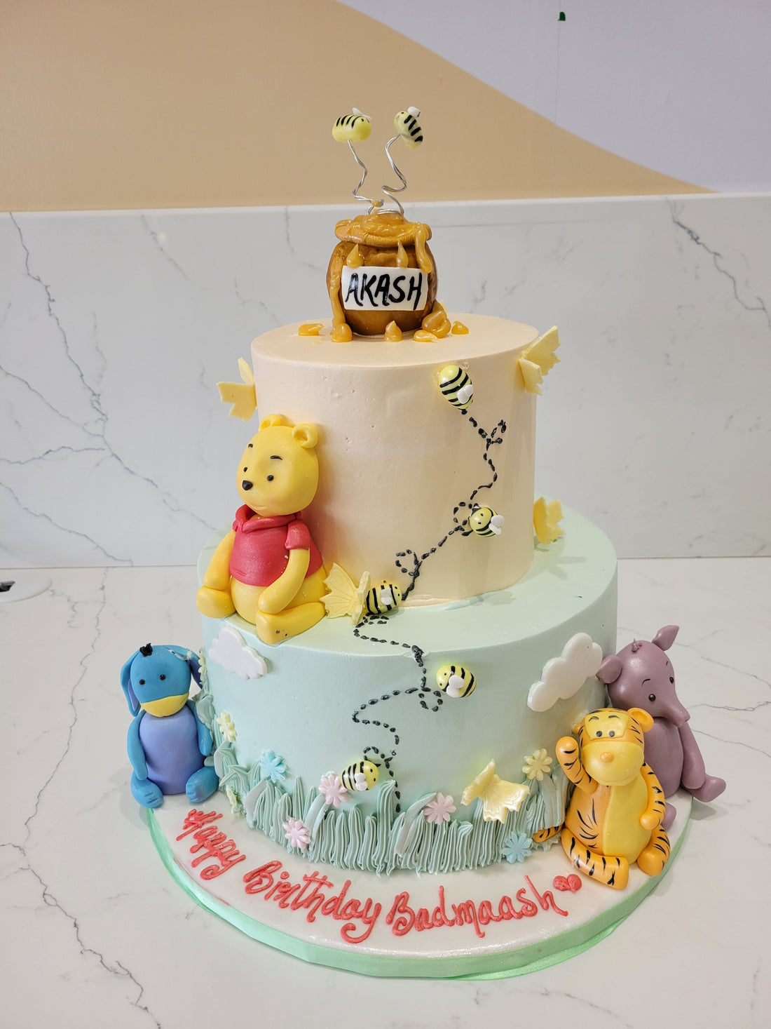 AKASH WINNIE THE POOH CREAM TIERED CAKE