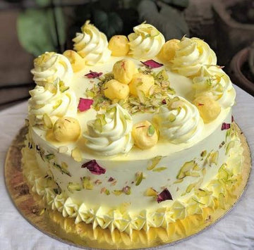 Attractive Yellowish Rasmalai Cake