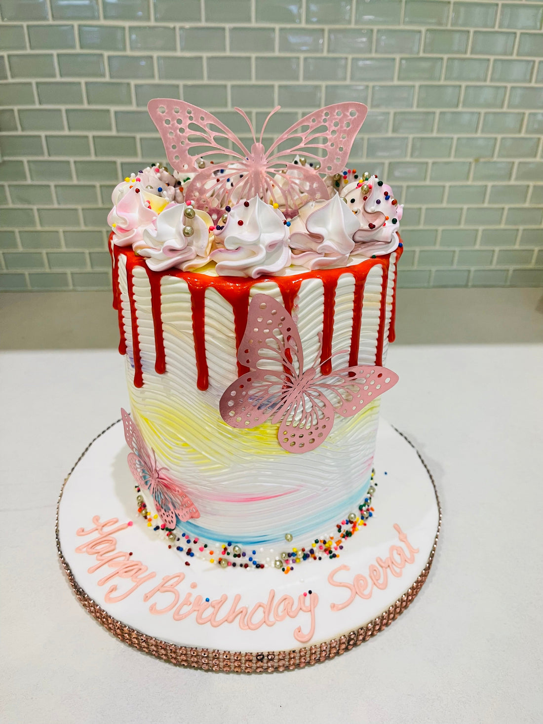 MULTICOLOURED BUTTERFLY CREAM CAKE