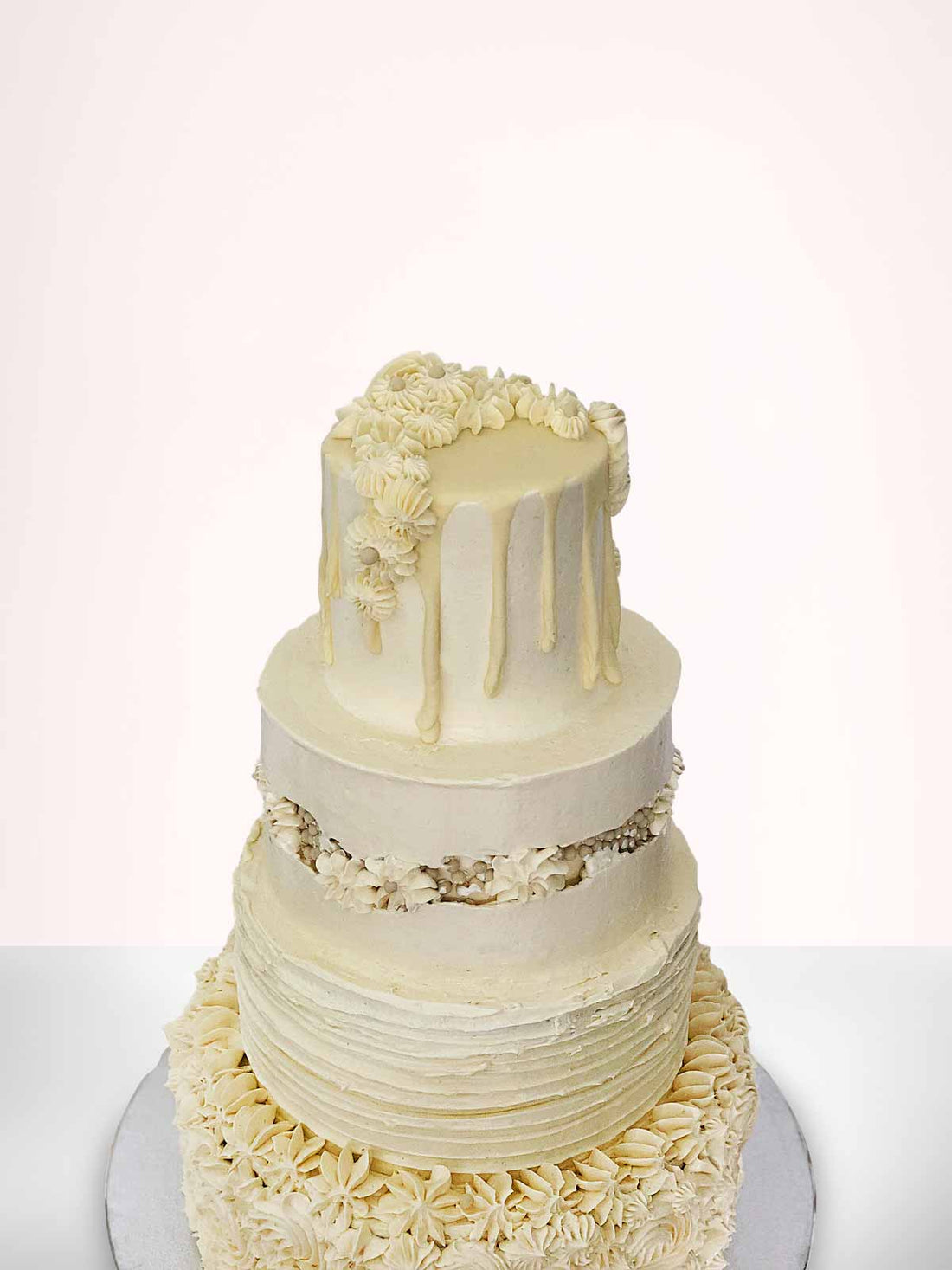 Four-Tiered Buttercream Dream Wedding Cake