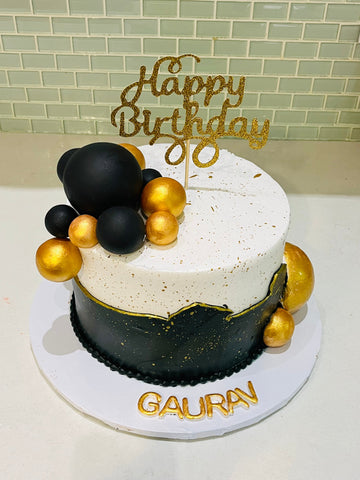 GAURAV BLACK AND GOLD BIRTHDAY CAKE