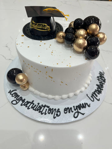 BLACK & GOLD GRADUATION CREAM CAKE