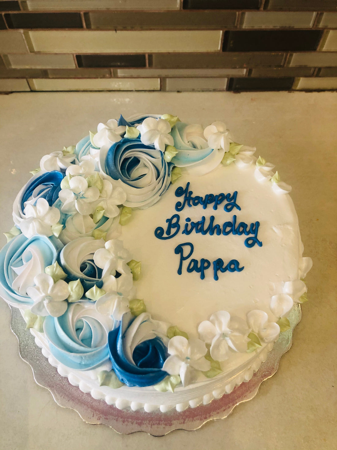 BLUE ROSETTE CREAM CAKE