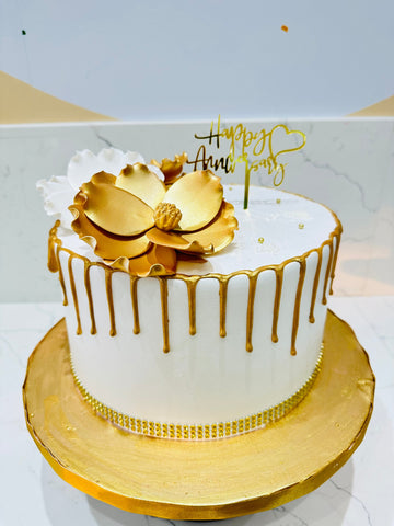 WHITE & GOLD ANNIVERSARY FLORAL CAKE