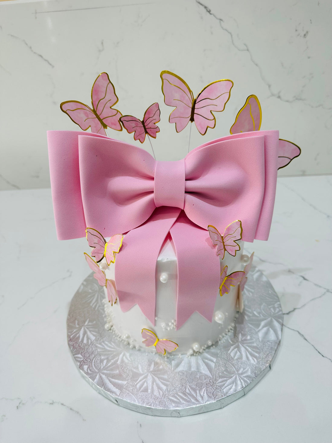 PINK BOW BUTTERFLY CREAM CAKE