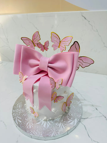 PINK BOW BUTTERFLY CREAM CAKE