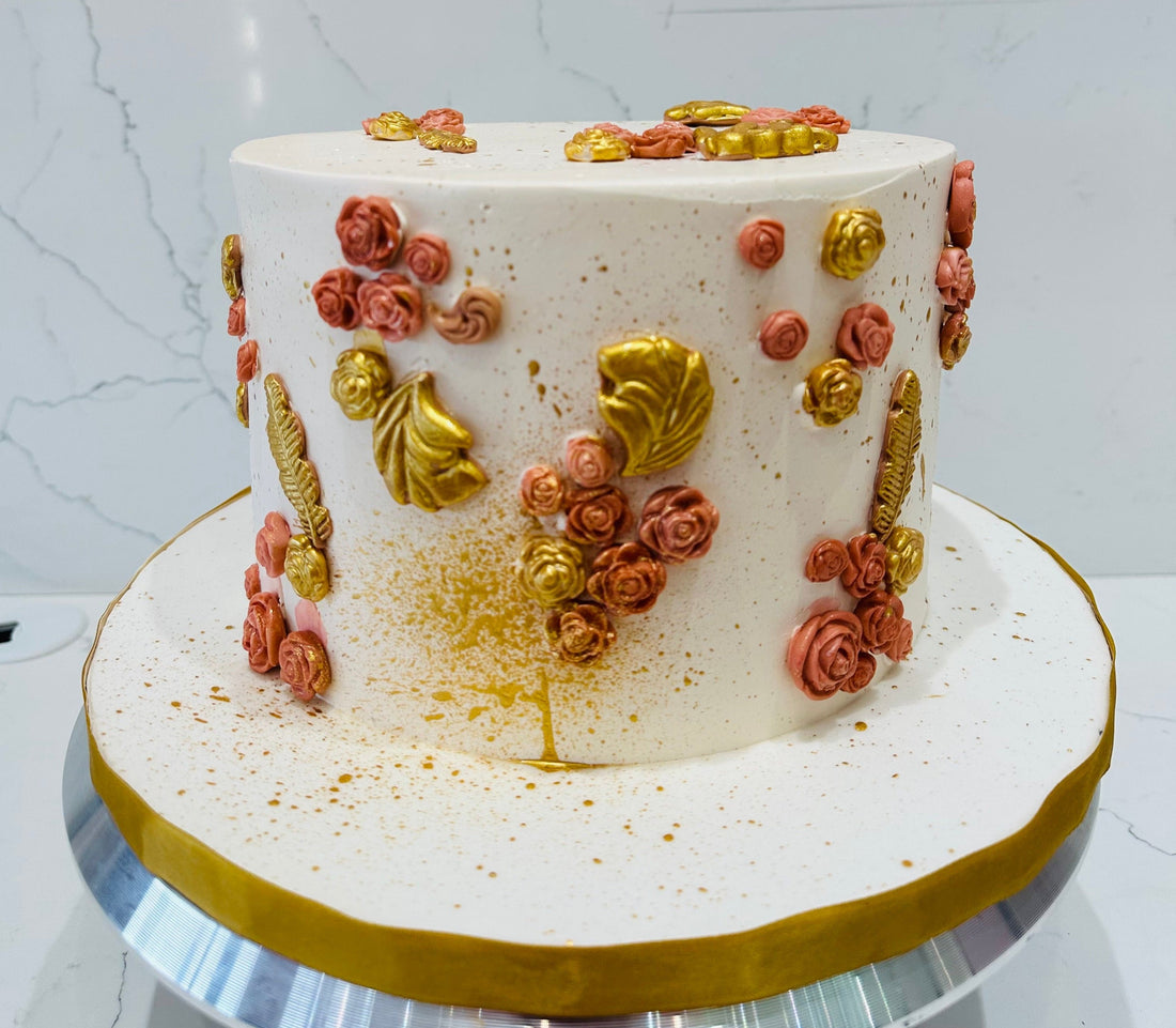 PEACH & GOLD FLORAL CREAM CAKE