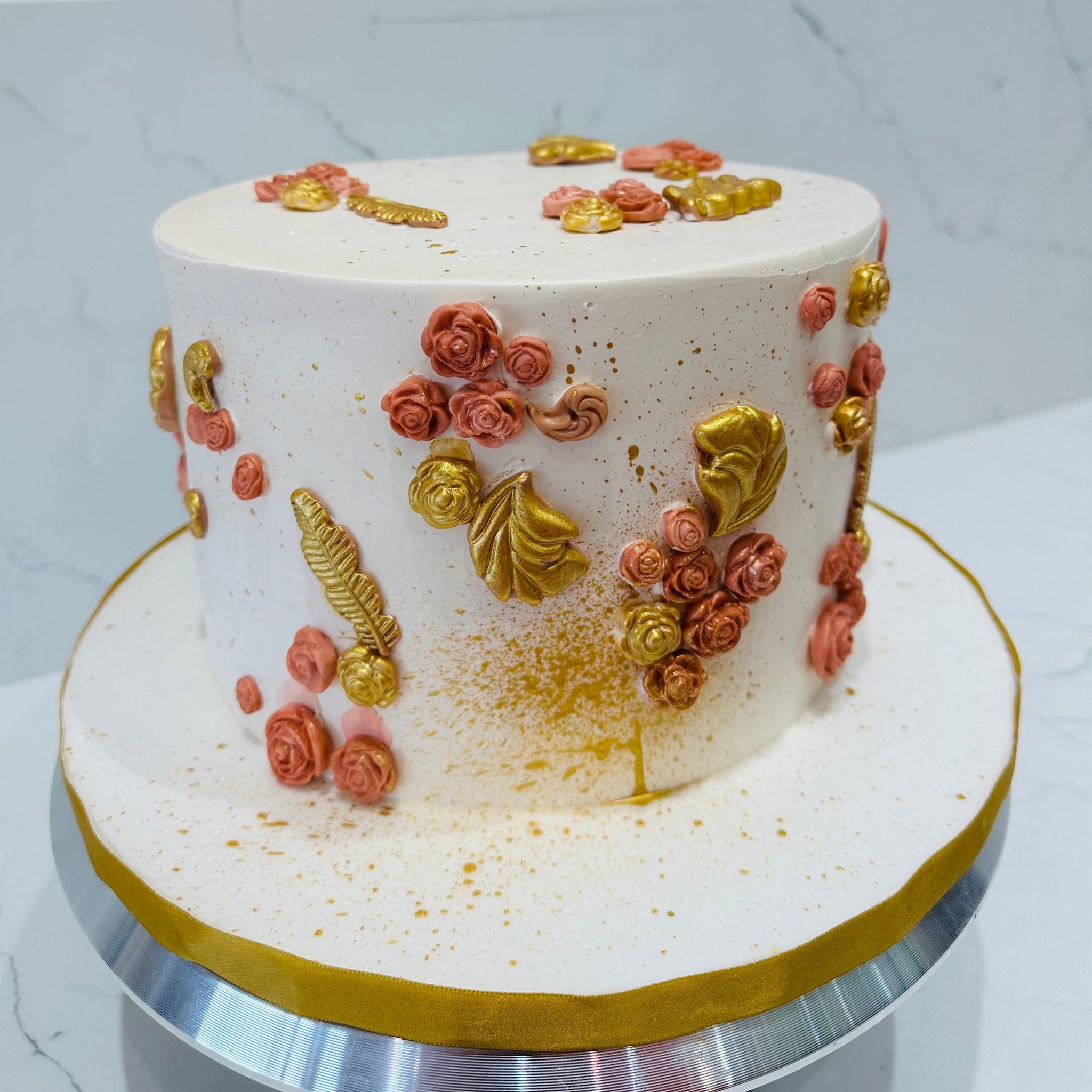 PEACH & GOLD FLORAL CREAM CAKE