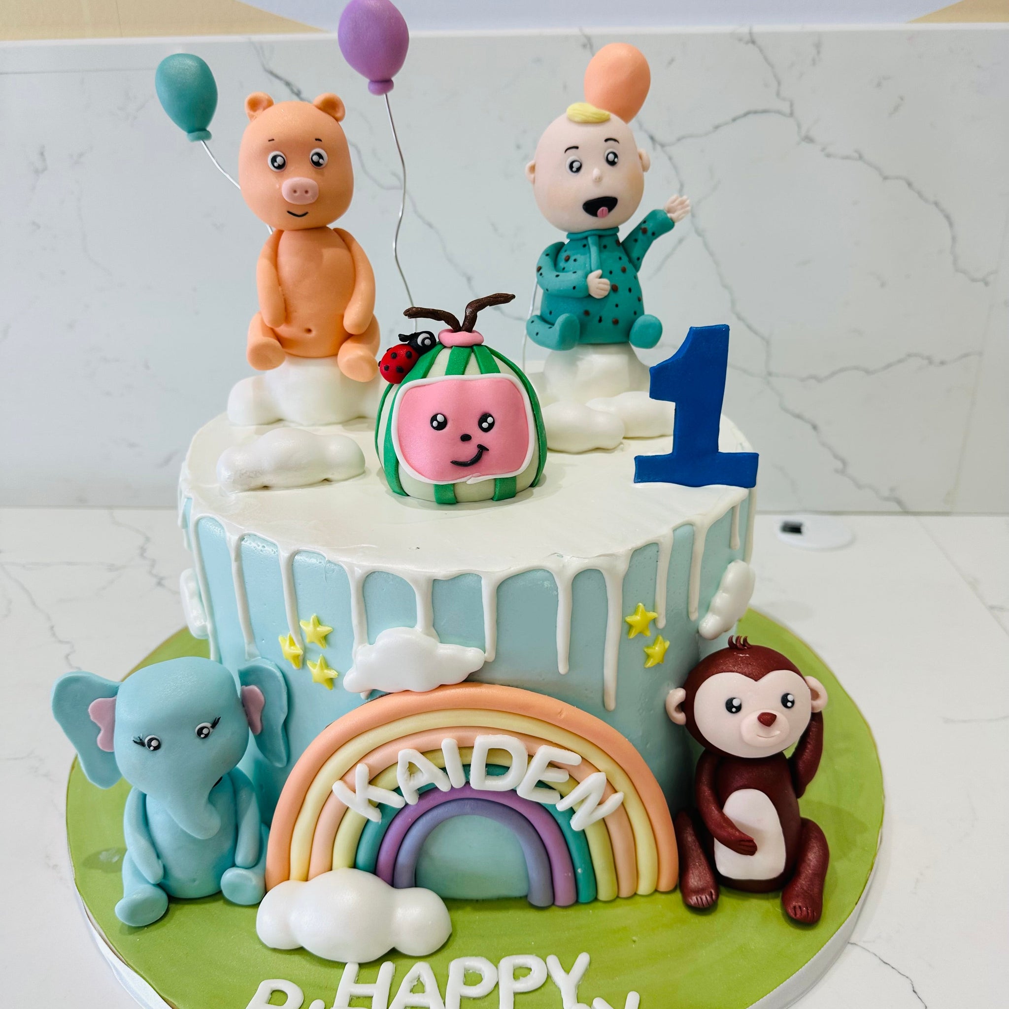 COCOMELON CHARACTERS FONDANT CAKE