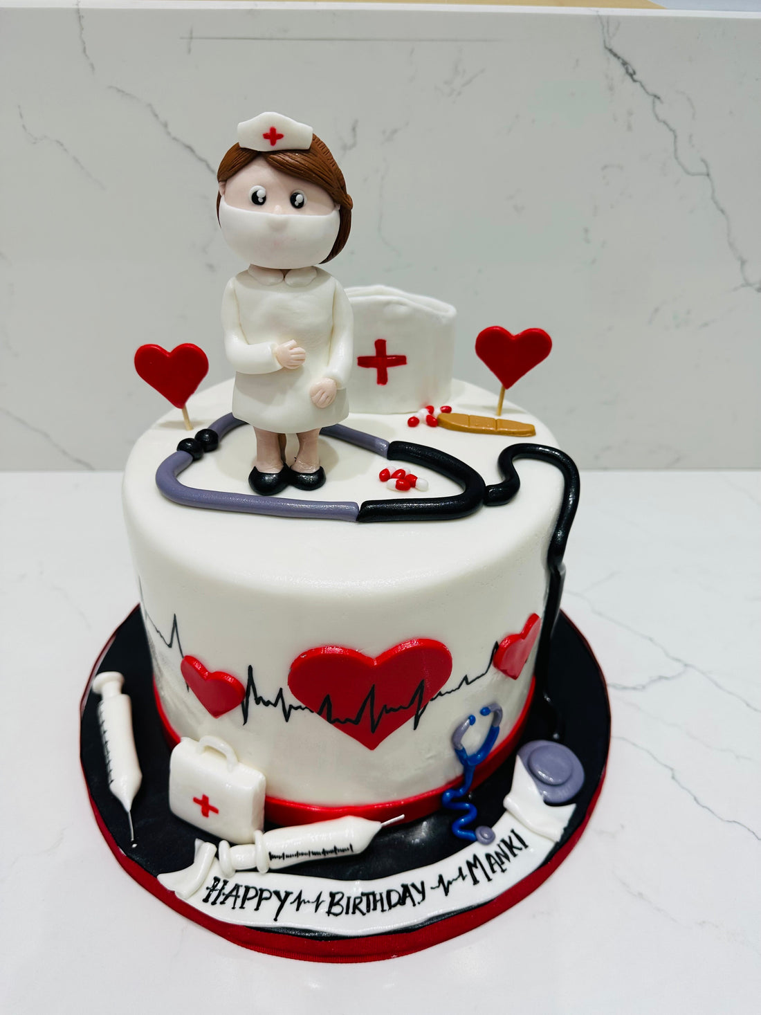 MANKI NURSE FONDANT CAKE