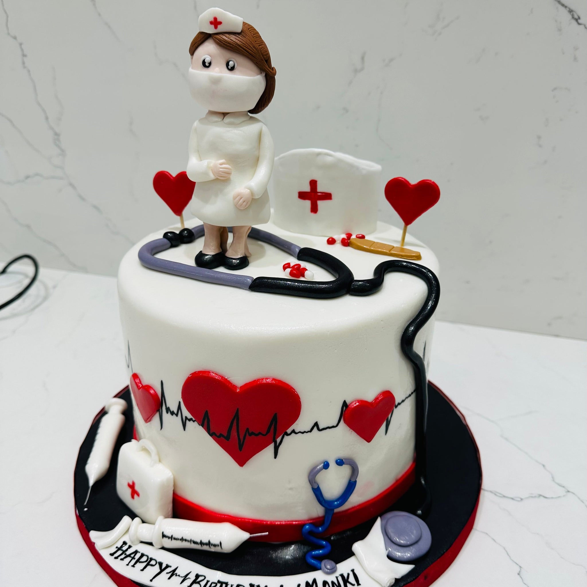 MANKI NURSE FONDANT CAKE