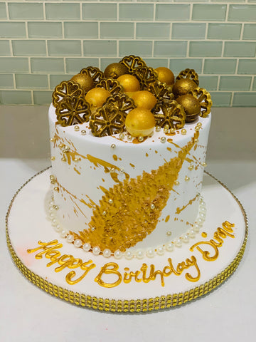 WHITE AND GOLD BIRTHDAY CAKE