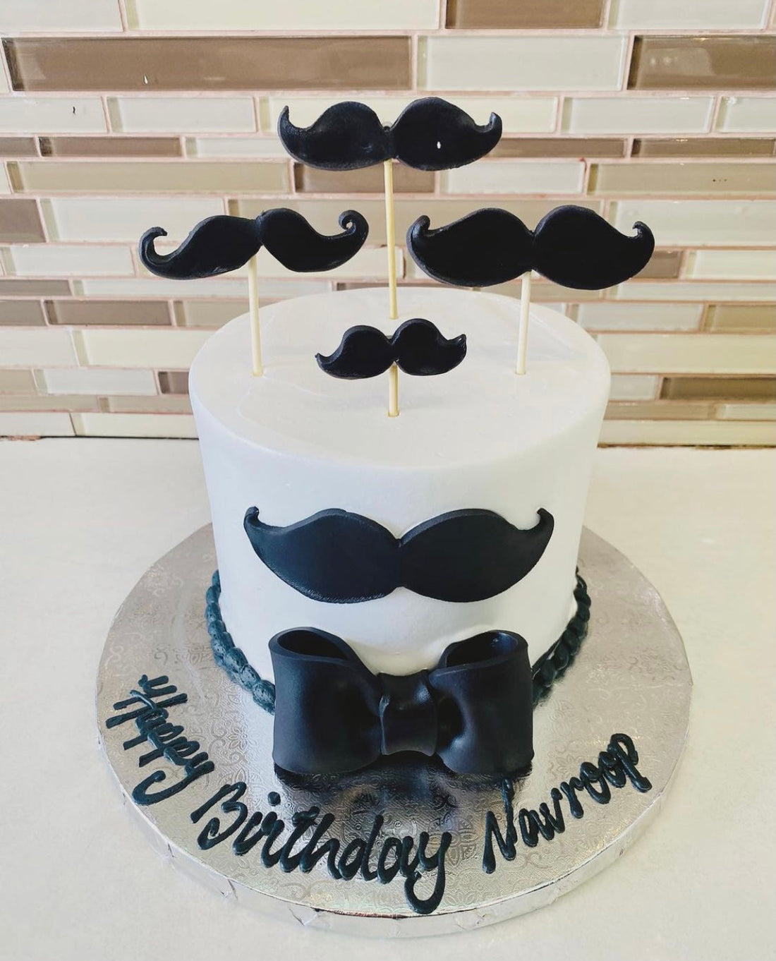 NAVROOP MOUSTACHE CREAM CAKE