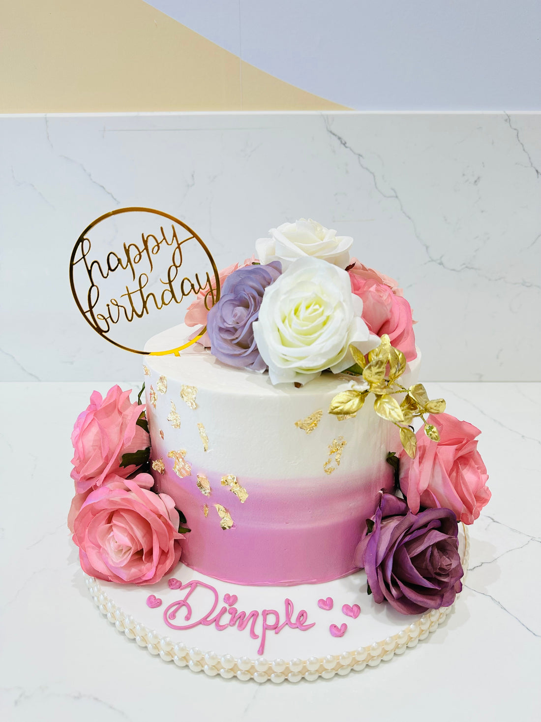 DIMPLE PASTEL FLORAL CAKE