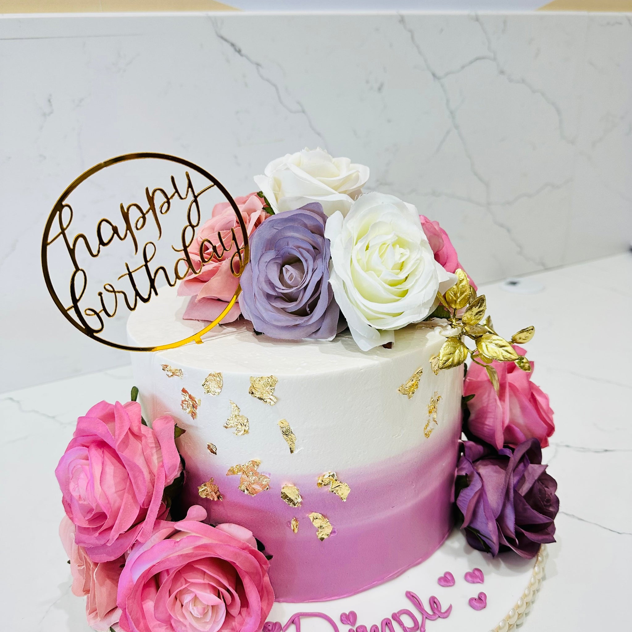 DIMPLE PASTEL FLORAL CAKE