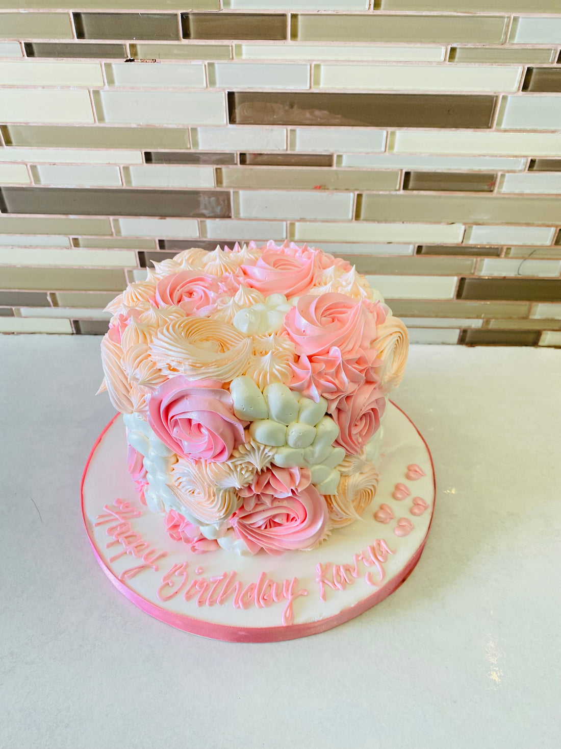 PINK AND IVORY CREAM ROSETTE CAKE