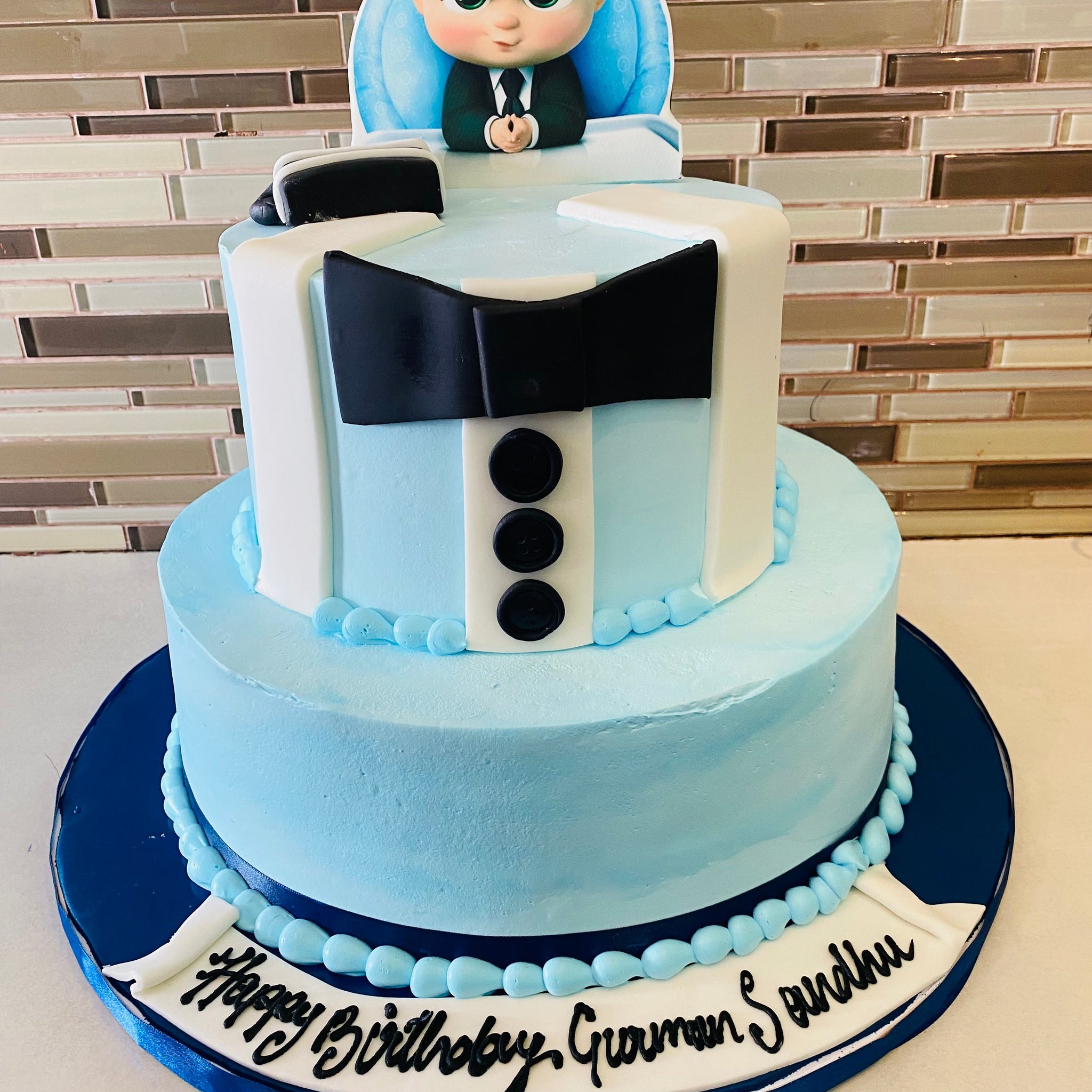 BOSS BABY TIERED CAKE