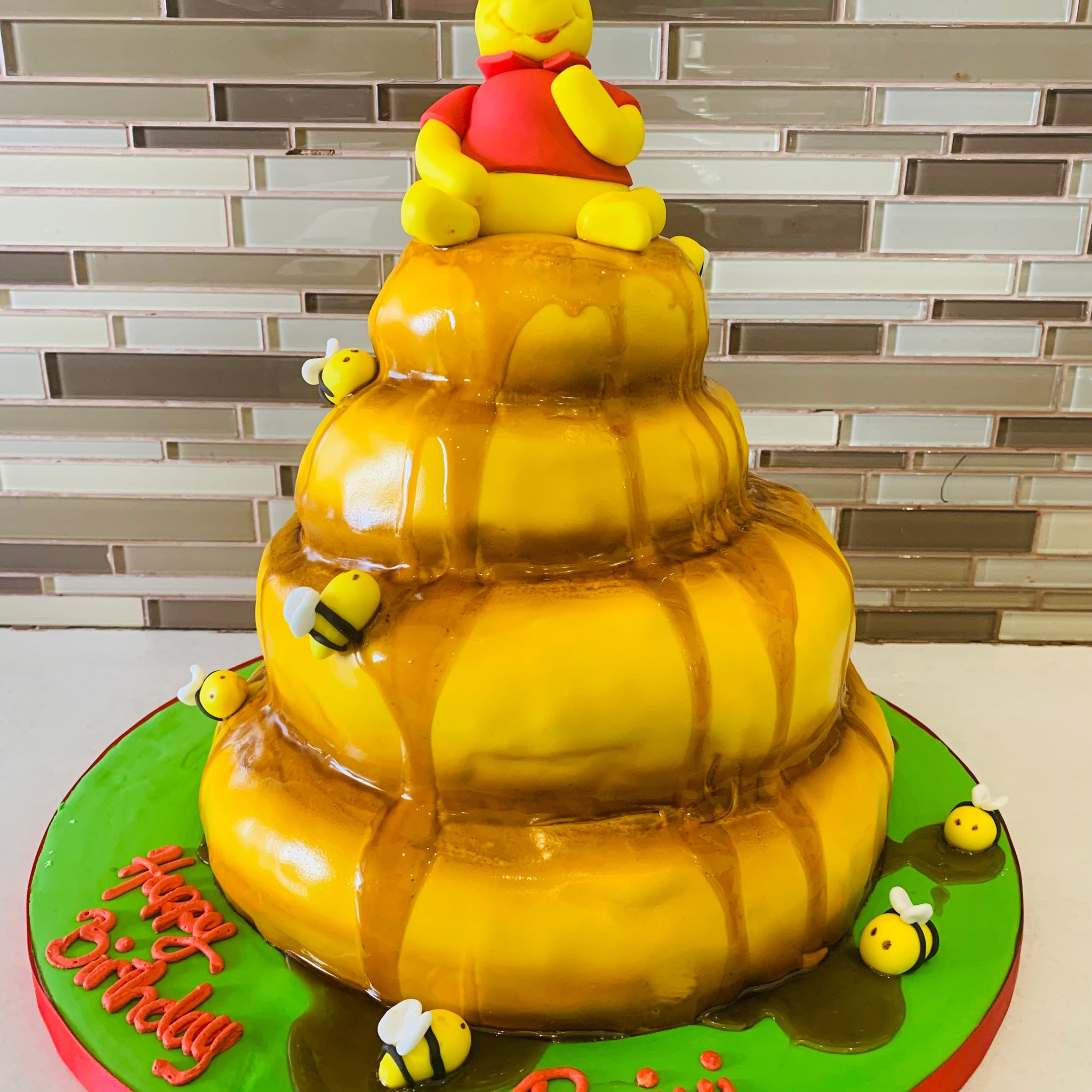 Winnie honey pot Molded fondant cake