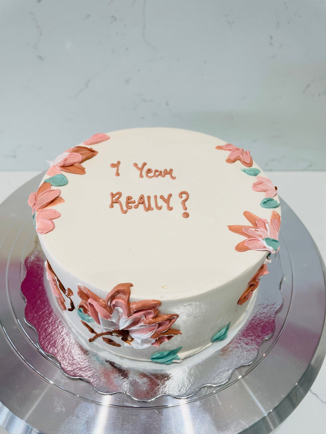 IVORY FLORAL CREAM CAKE