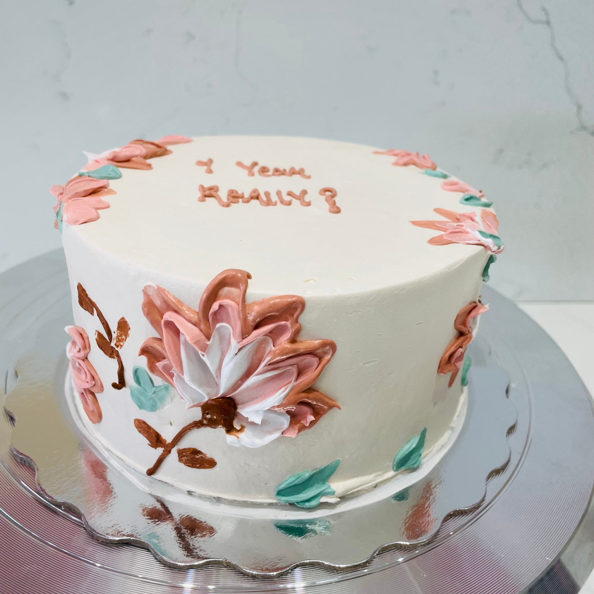 IVORY FLORAL CREAM CAKE