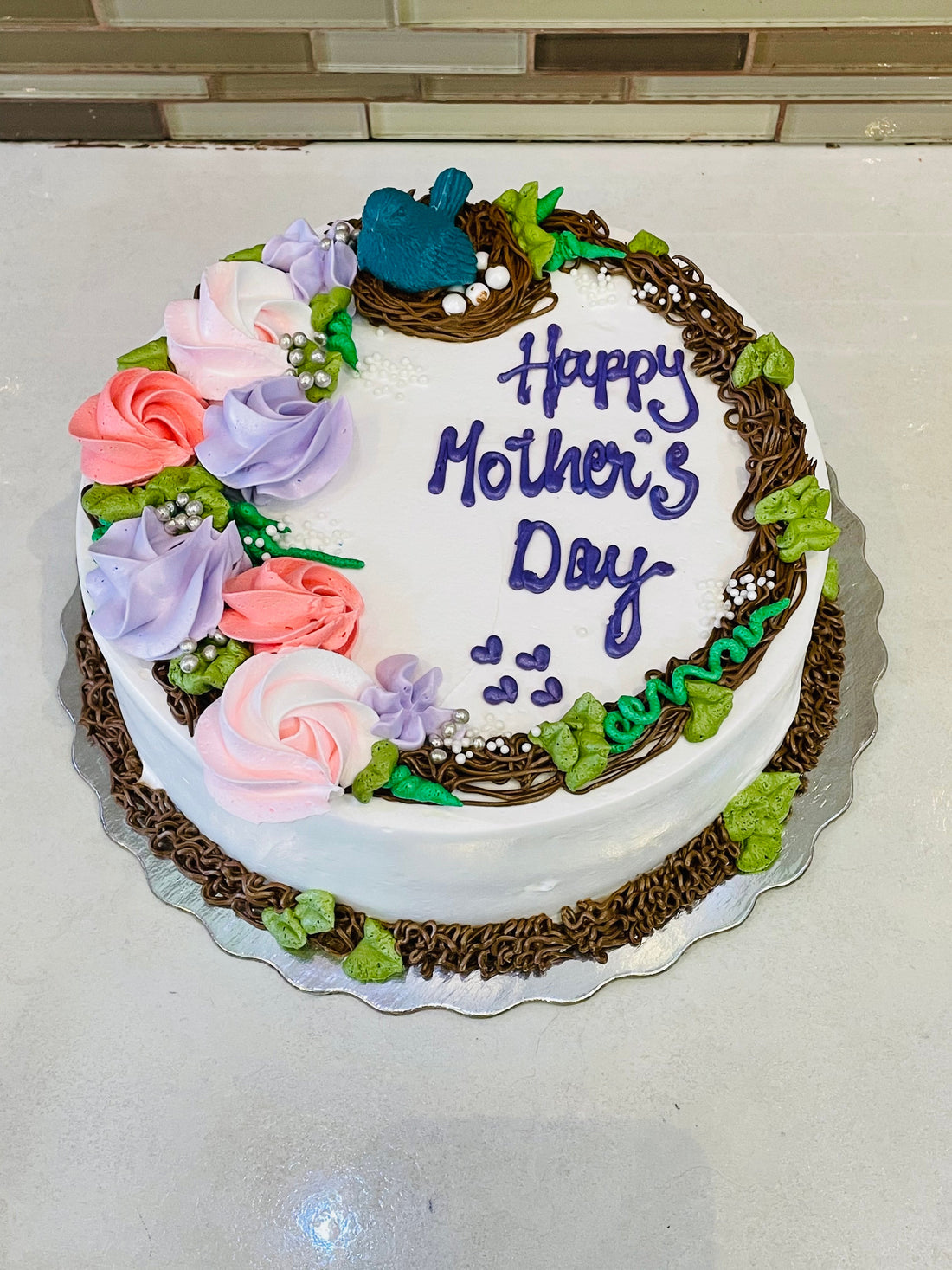 NESTLING MOTHERS DAY CAKE