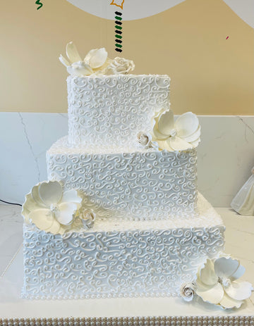 WHITE THEME WEDDING TIERED CAKE