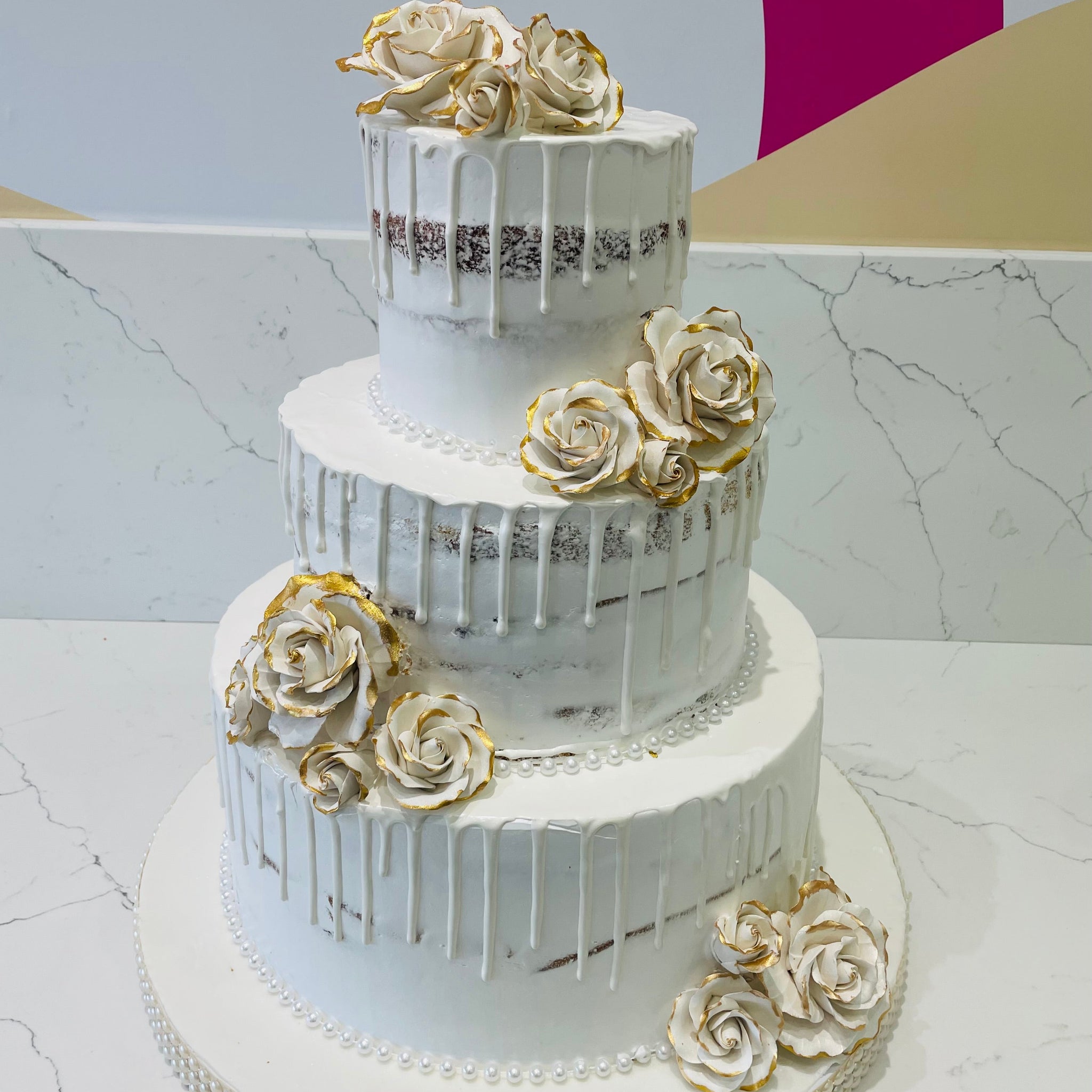 GOLD & WHITE DRIZZLE WEDDING CAKE