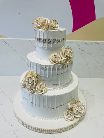 GOLD & WHITE DRIZZLE WEDDING CAKE