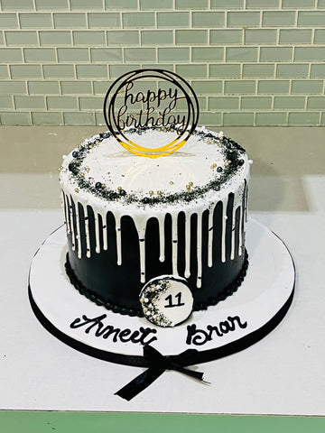 AVNEET BLACK AND WHITE BIRTHDAY CAKE