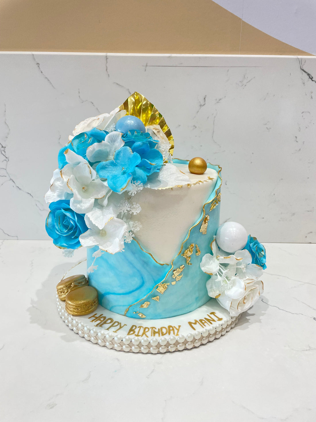 MANI BLUE RUFFLES FONDANT CAKE