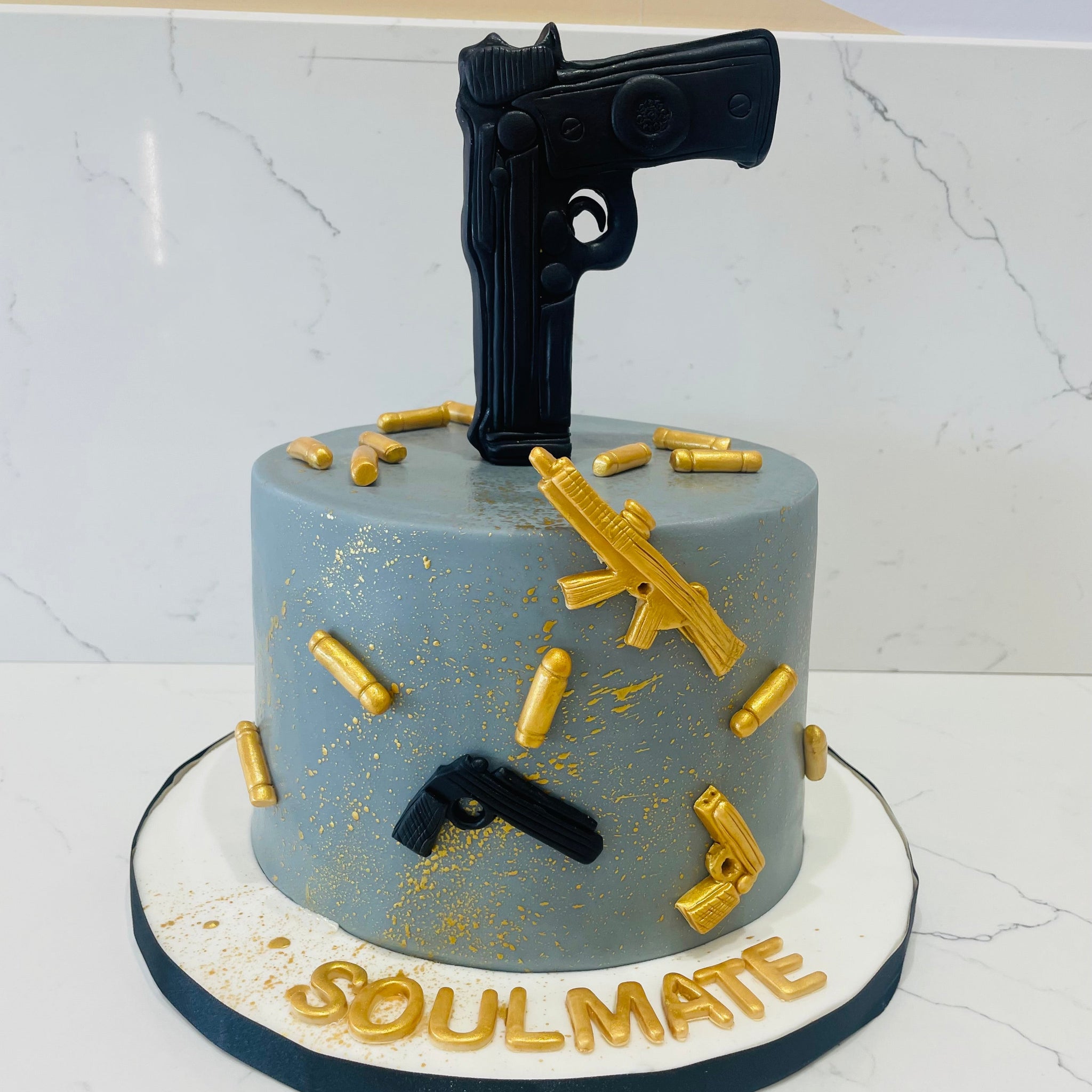 GUN FONDANT CAKE