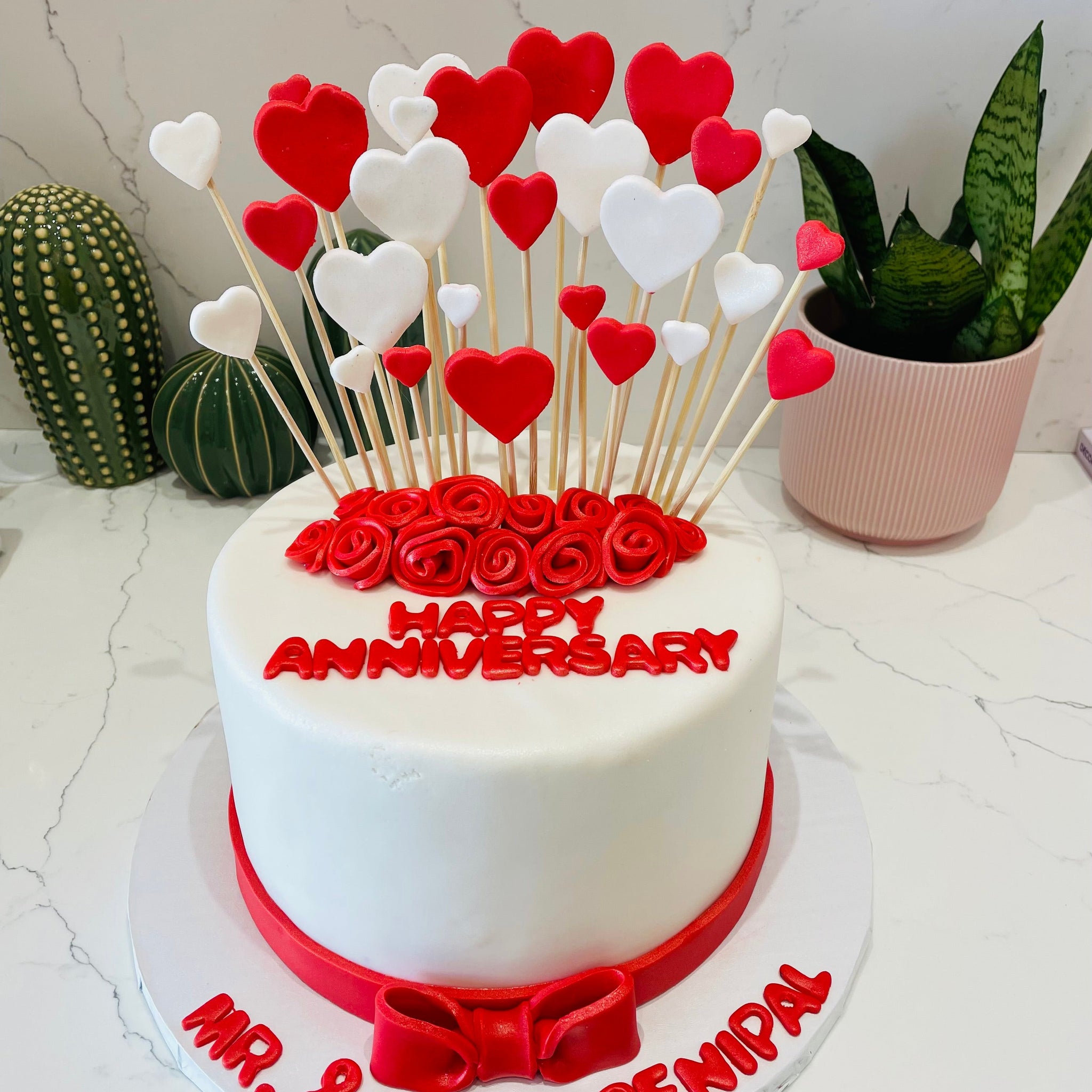 RISING HEARTS FONDANT CAKE