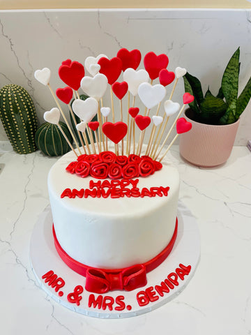 RISING HEARTS FONDANT CAKE