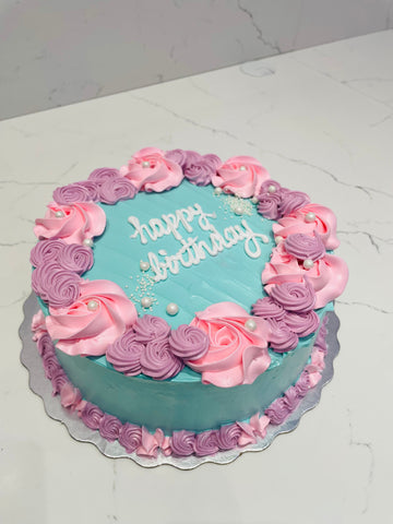 TEAL & PINK ROSETTE CAKE